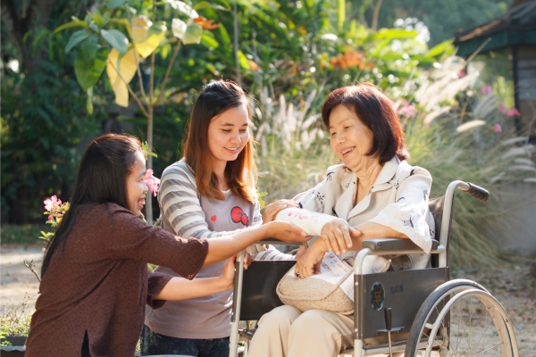 A person in a wheelchair navigating a modern home environment, highlighting independence and accessibility.